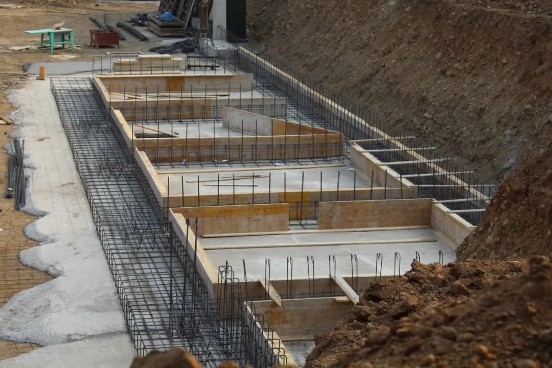Jakie przepusty w fundamencie: kluczowe informacje i porady dotyczące instalacji